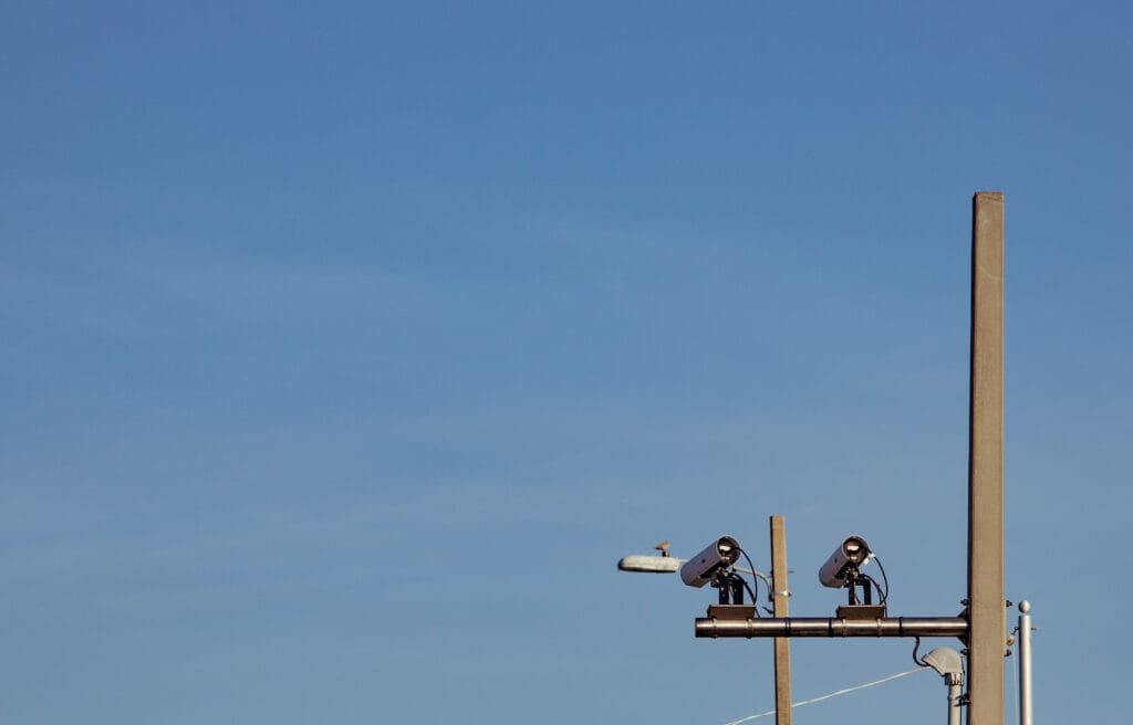 Automated license plate reader cameras mounted on a roadside pole