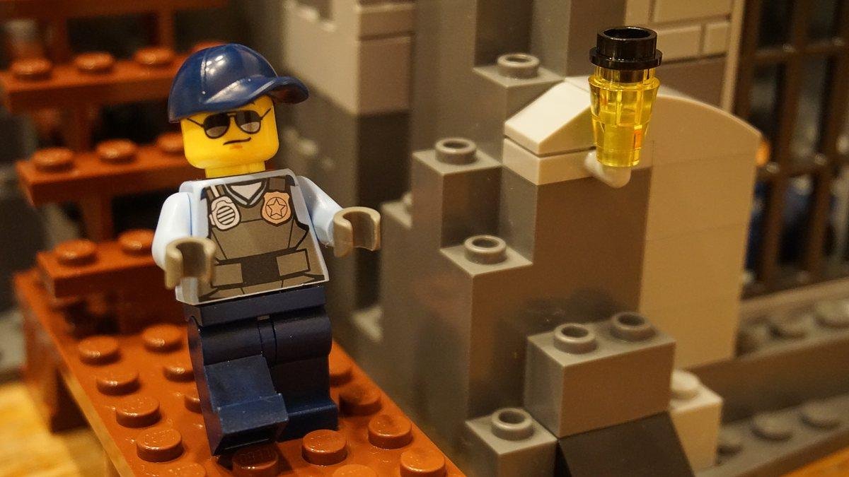 Lego bricks and a minifigure on a build plate