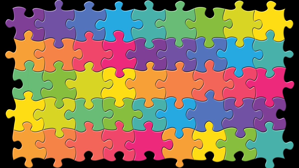 Interlocking jigsaw puzzle pieces in bright colors